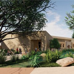 Entrance to education center with wildflowers in the gardens