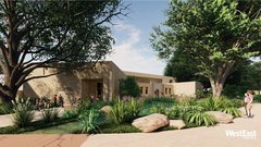 Entrance to education center with wildflowers in the gardens