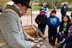 Students discover more about life in the 1830s from an Alamo living historian.