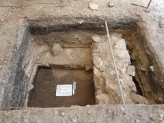 Caliche and lime surface inside an excavation unit
