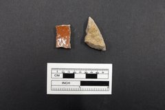 Two pieces of lead glazed ceramics next to a ruler for size
