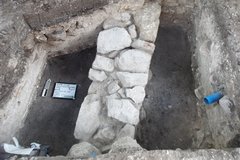 Limestone feature going across an excavation unit