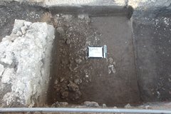 Rocky border inside of an excavation unit