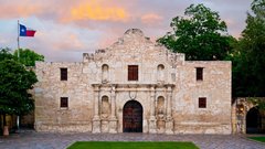 Alamo Church with green grass in front in daylight