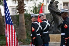 Marines at a ceremony after presenting the American and Marines flag