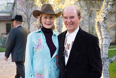 Judge and Mrs. Wolff smiling at an event