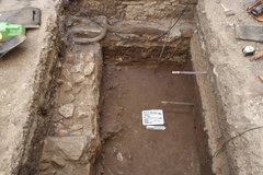 Sandy mortar limestone step inside an excavation unit