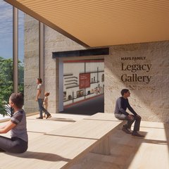 Entry to gallery next to a floor to ceiling window