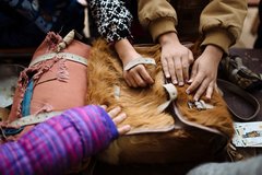 Students get hands on with a reproduction 1830s soldier's pack.