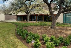 Exterior view of Ralston Family Collections Center with gardens in the front