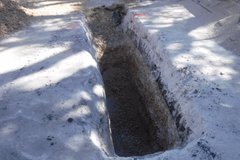 Backhoe trench facing north