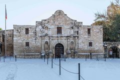 Alamo Church with ground covered in snow