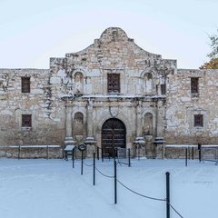 Alamo Church with ground covered in snow