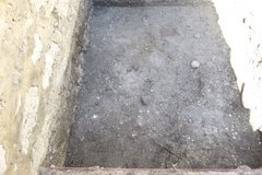 Dirt surface inside an excavation unit
