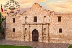 Front view of Alamo Church with iconic parapet and seal of Kulture City certification
