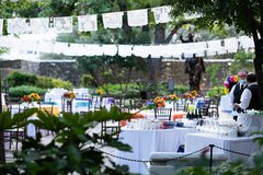 Tables set up for dining in Cavalry Courtyard