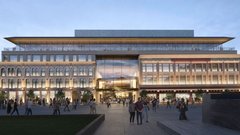 Evening view of facade of Alamo Visitor Center and Museum