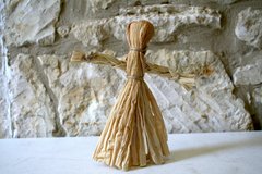 A corn husk doll.