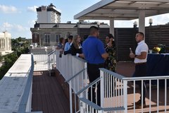 Guests enjoying cocktails at La Vista Terrace