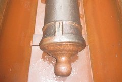 An Alamo cannon emerges from a rinse bath.