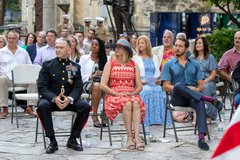 Marine General and audience seated at a ceremony in Cavalry Courtyard