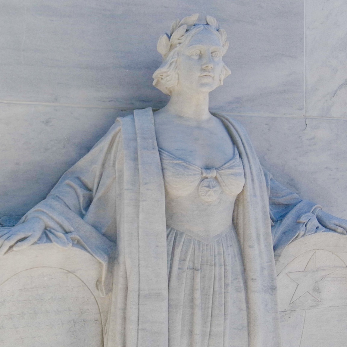 Woman sculpted on Alamo Cenotaph monument