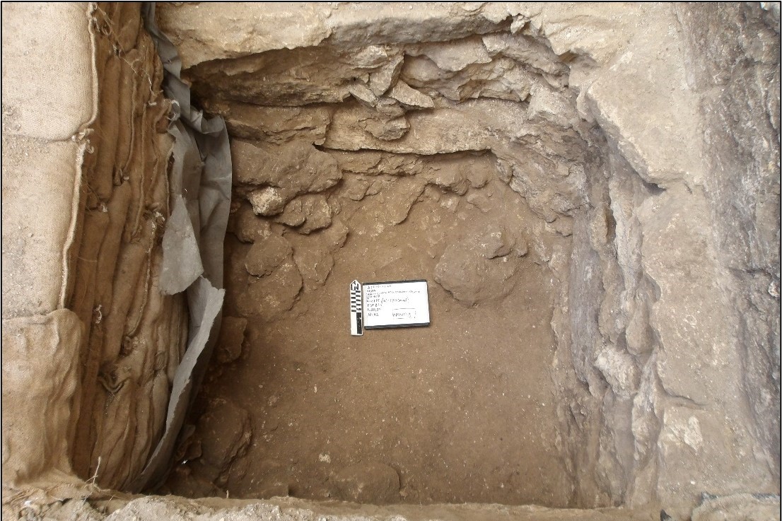 Excavation unit with several layers of limestone steps