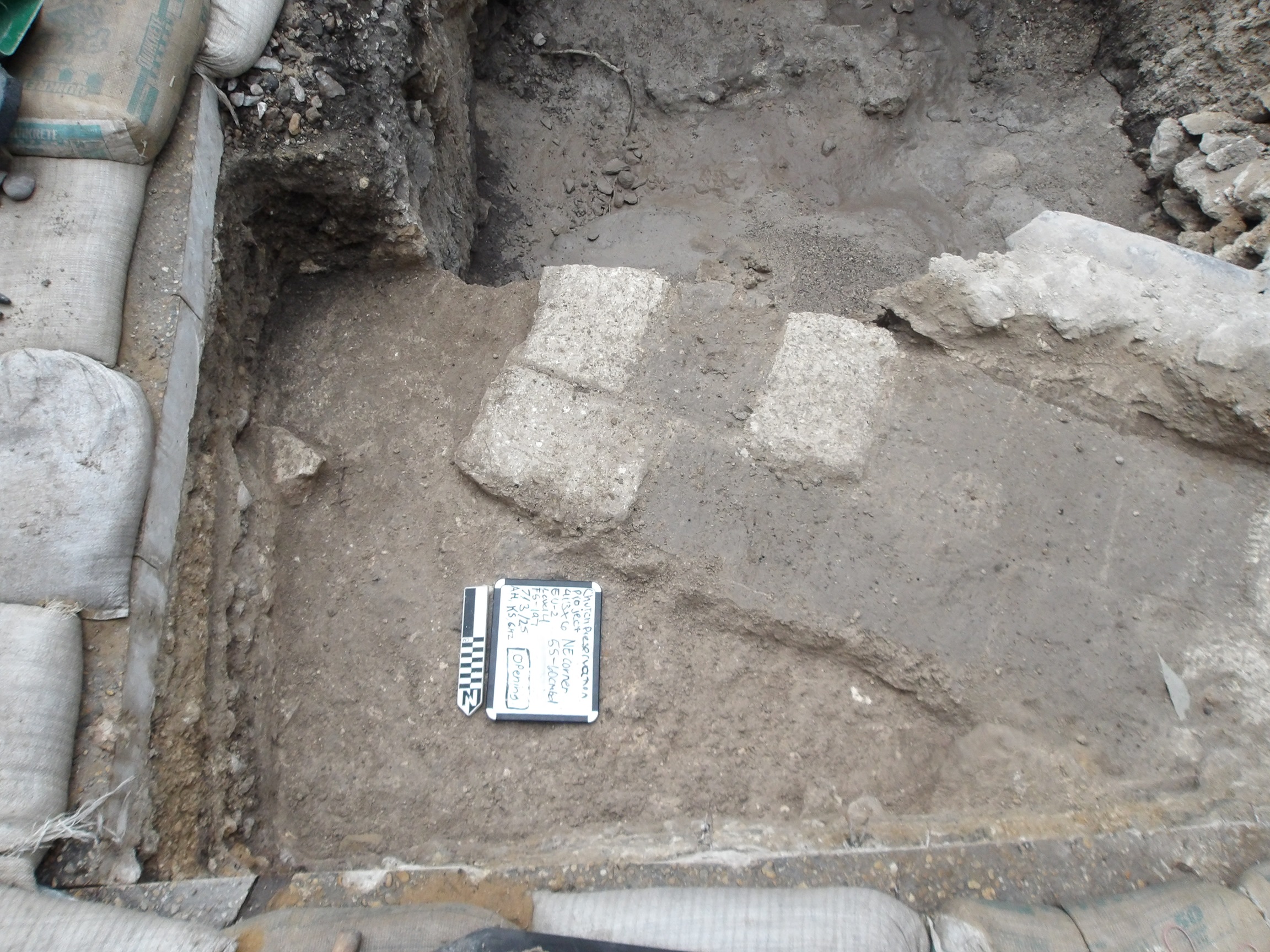 Adobe pavers, facing South, on bottom exposed surface of excavation unit