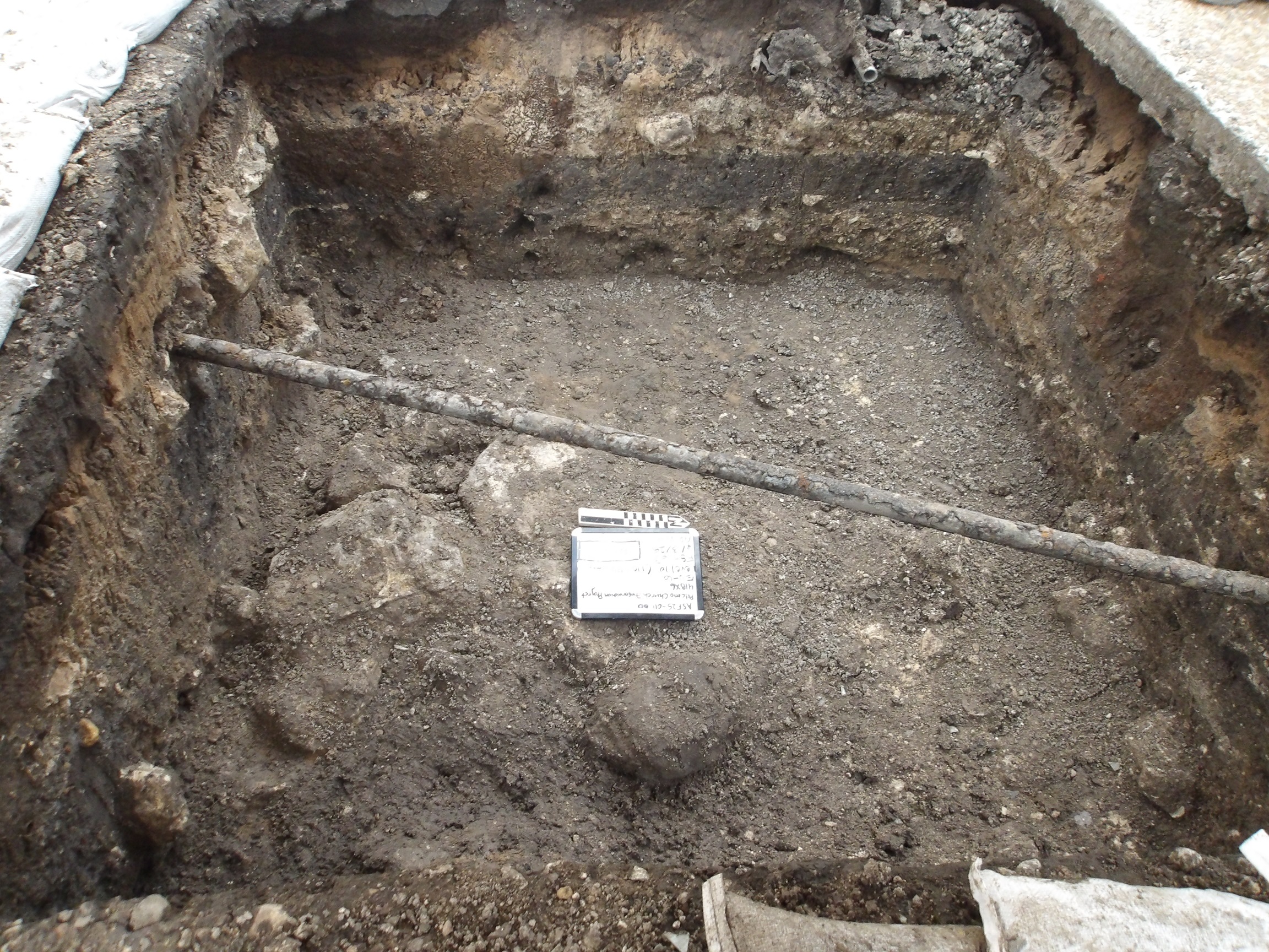 Pipe across the top of an excavation unit