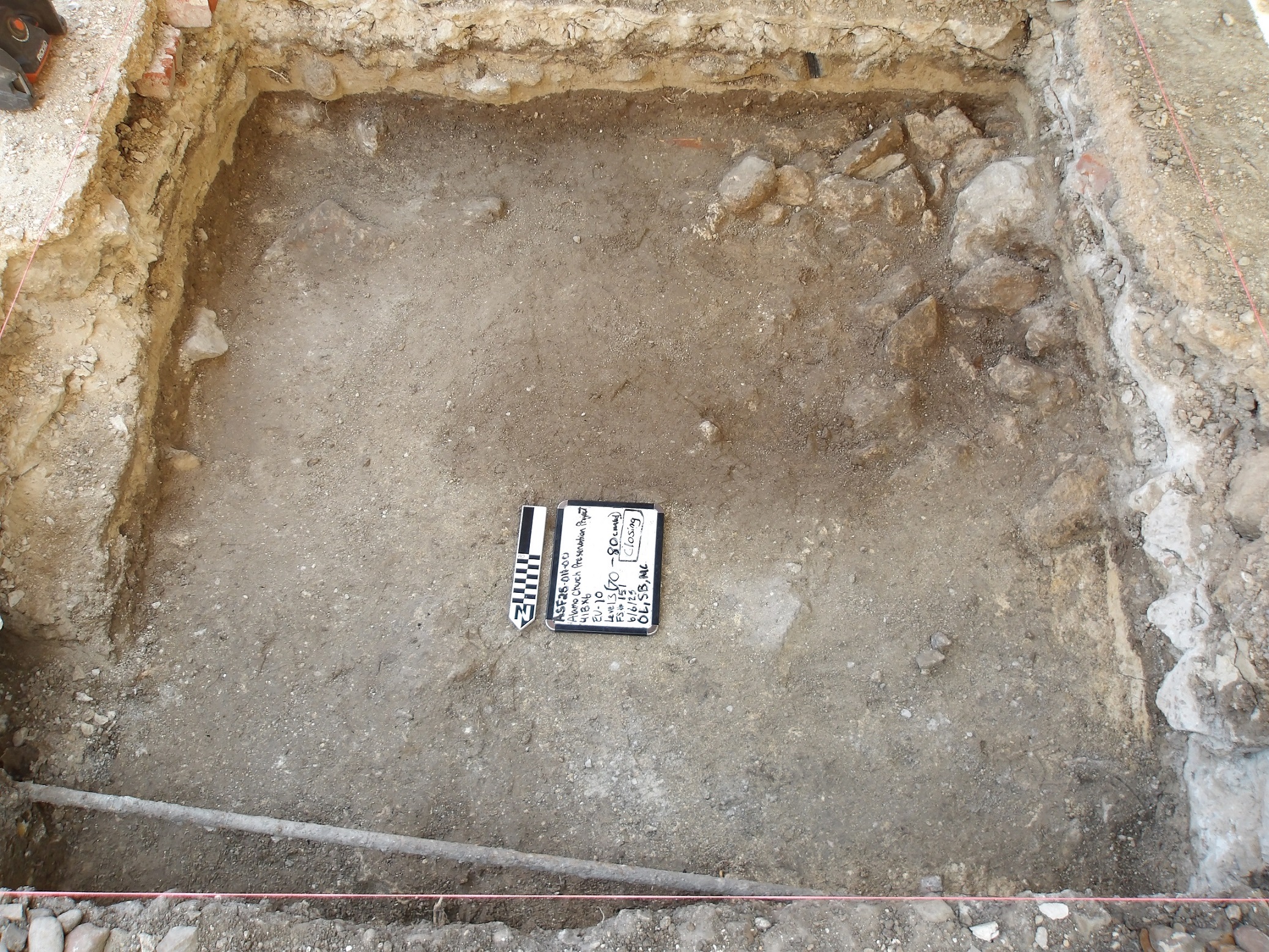 Excavation unit with limestone at perimeter