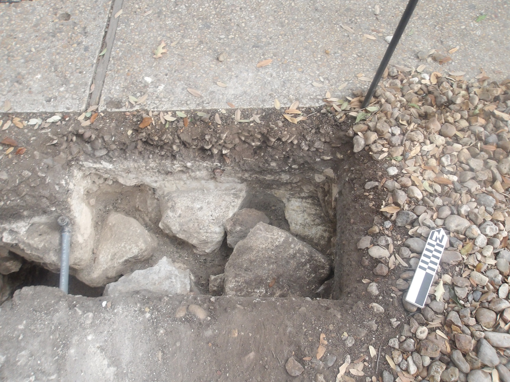 Limestone foundation at the top of an excavation area