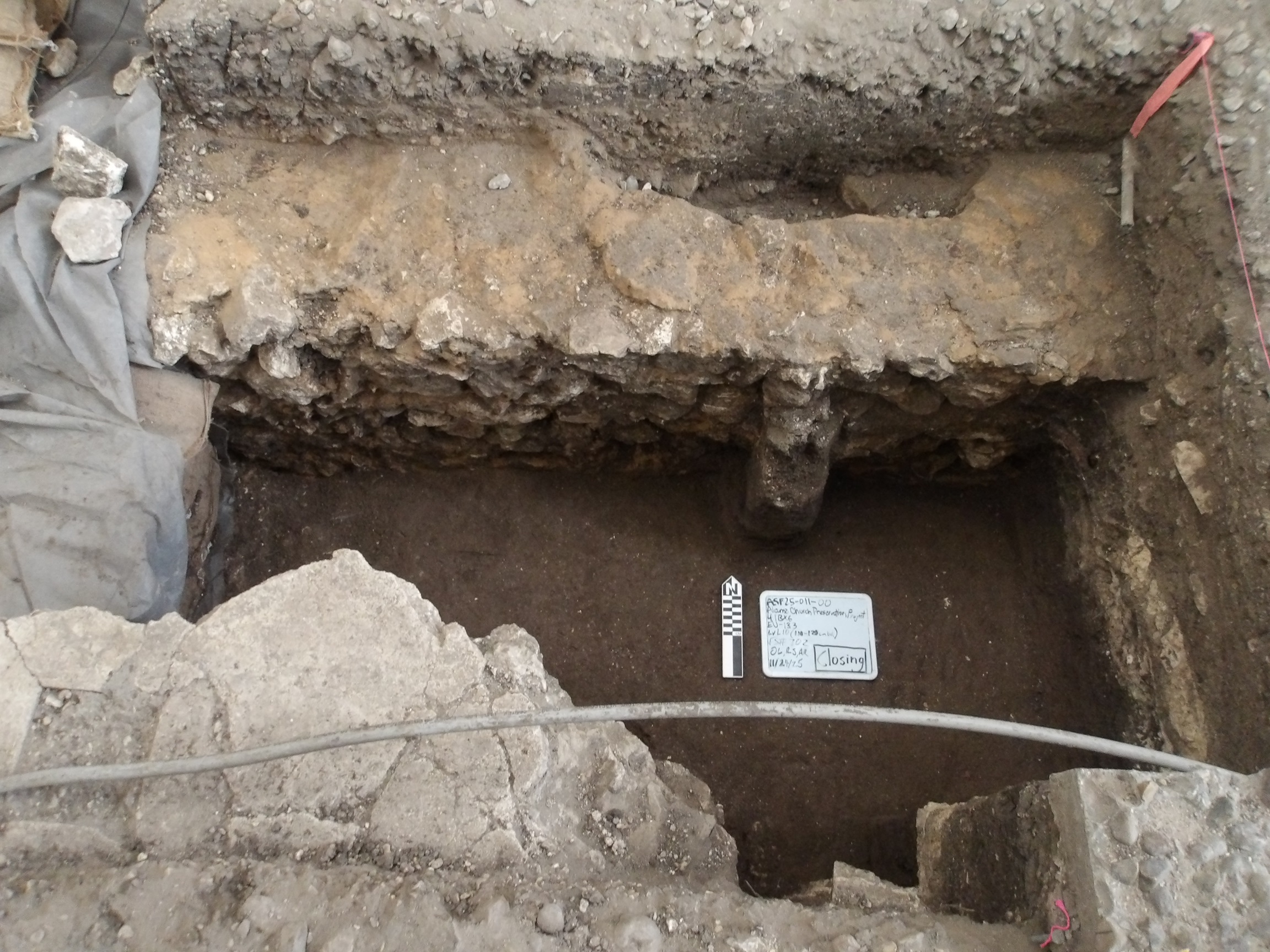 Stairstep feature 100 cm below surface in an excavation unit